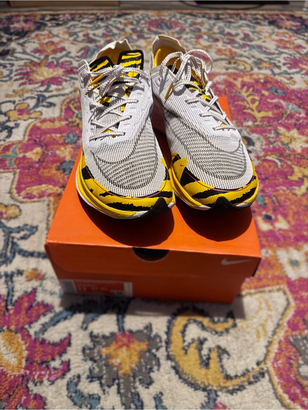 Men’s Nike ZoomX Vaporfly Next%2
White Sneakers with Yellow and Black Accent